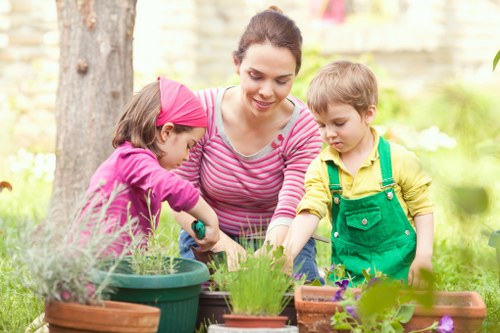 Experienced gardener from Gardener Downham pruning plants
